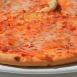 Pizza canchera: historia de un ícono de la comida callejera