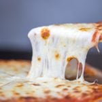 ¿Cuánta muzzarella tiene que llevar una pizza?
