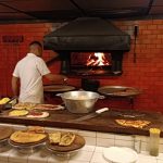 Pizza al tacho, el secreto mejor guardado de un restaurante casi centenario